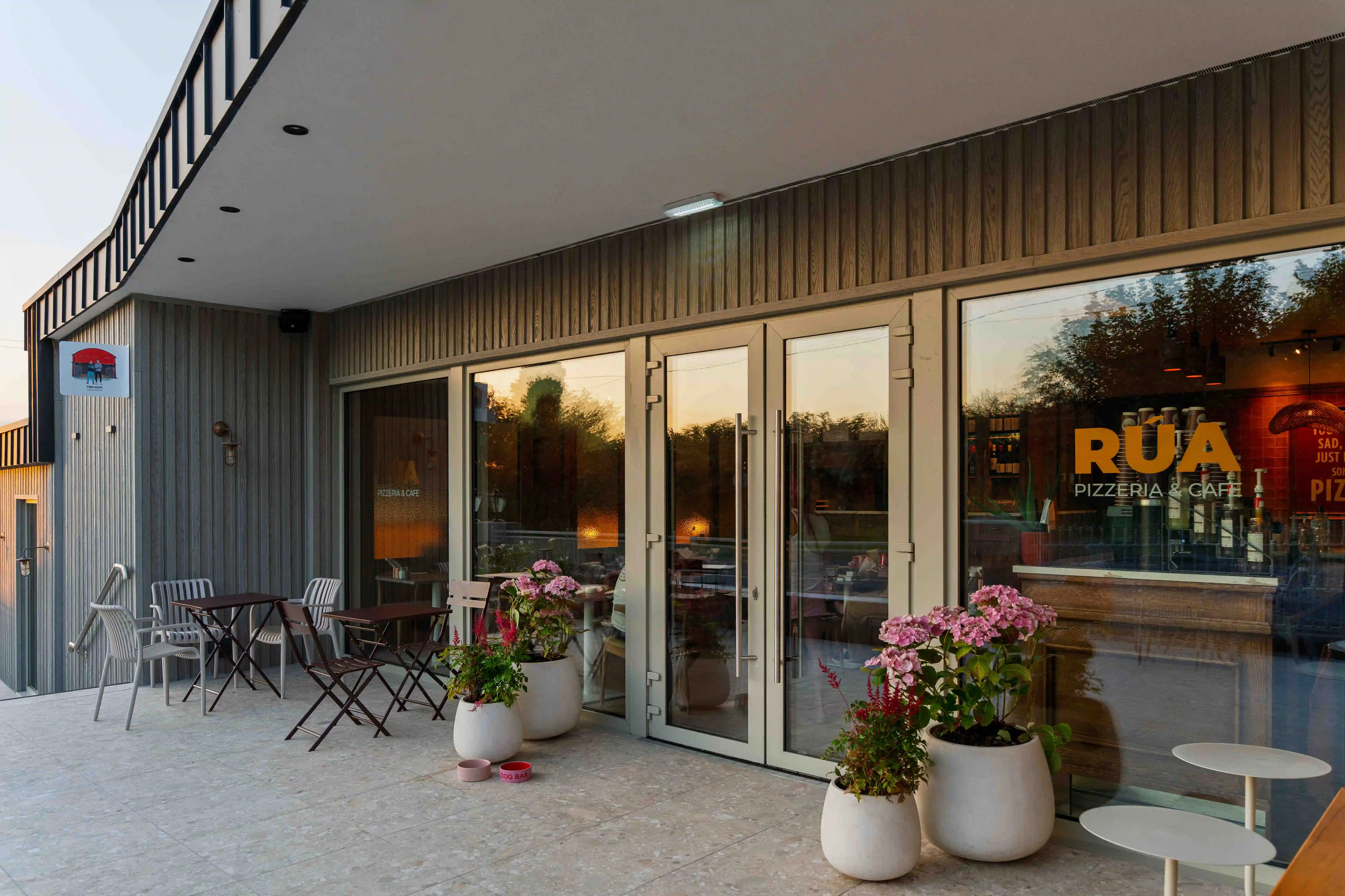 Exterior shot of Rua cafe and pizzeria at the Cross guns