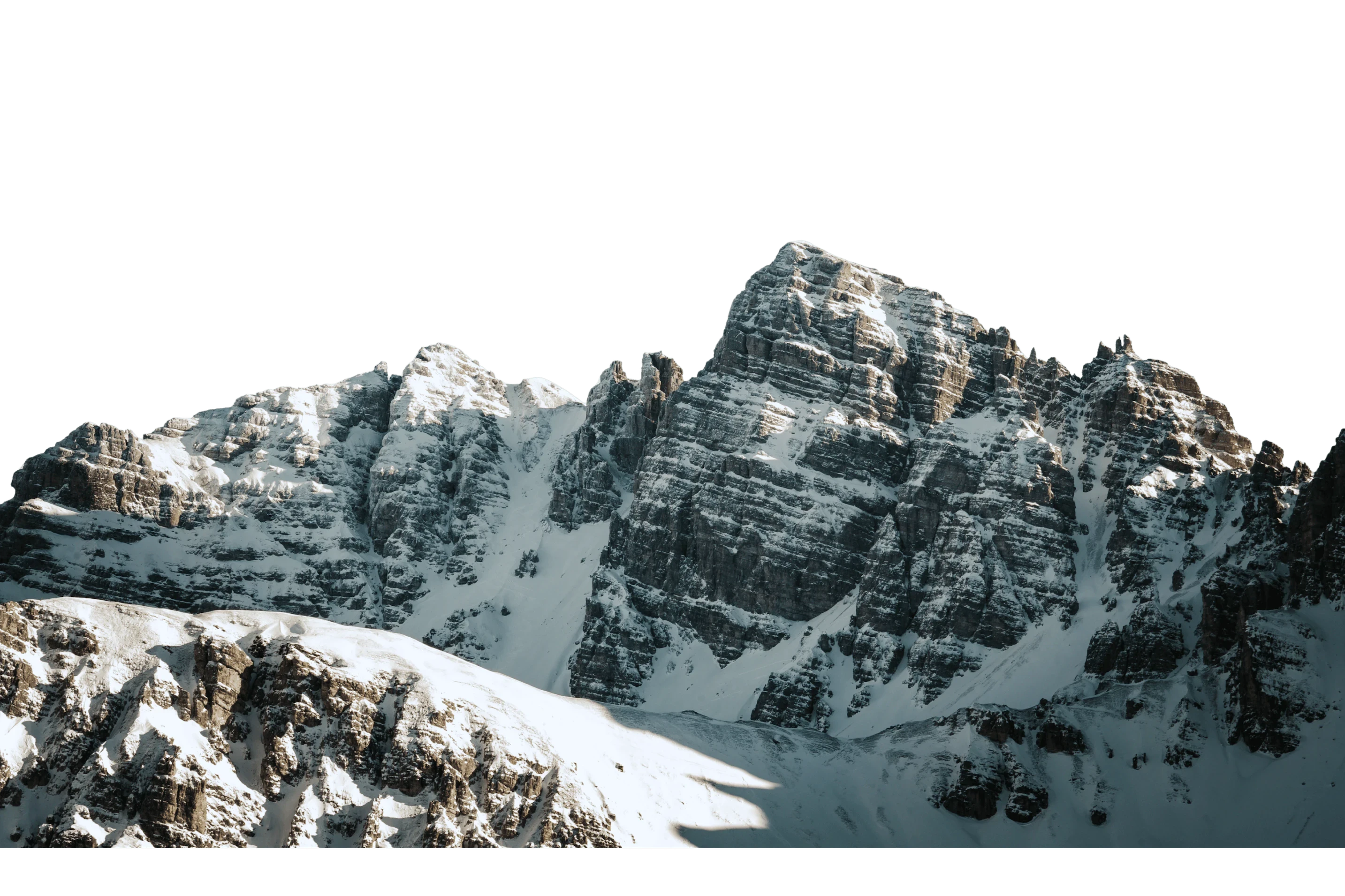 Majestic snow-covered mountain peaks against a black sky.
