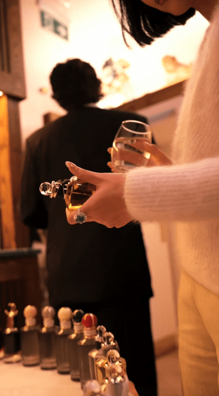 Bride and groom walking on street at night