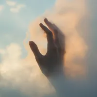 Hand in Ethereal Cloud