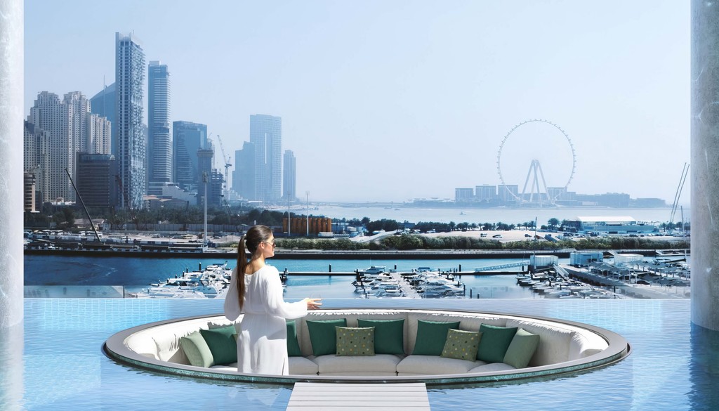 An exterior pool at W Residences, offering a panoramic view from a high floor.