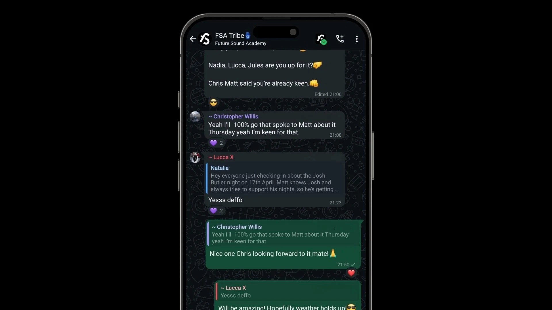 A DJ standing at a mixing board, wearing headphones and a white t-shirt, working with Pioneer DJ equipment.