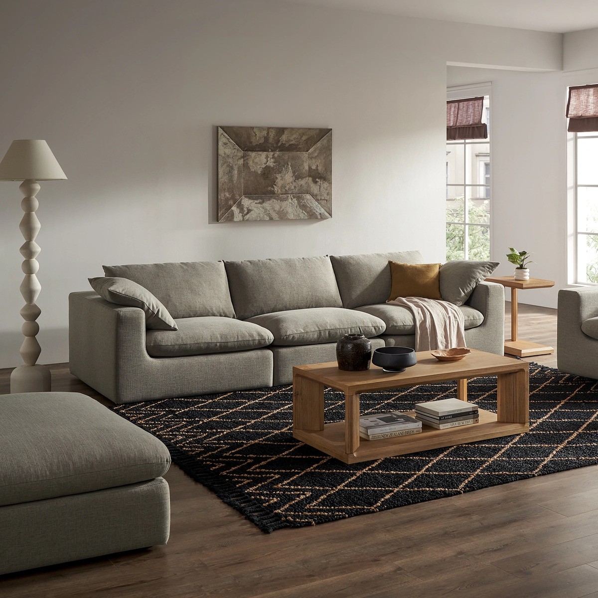 Gray Dawson extended sofa in a cozy living room with warm wood accents