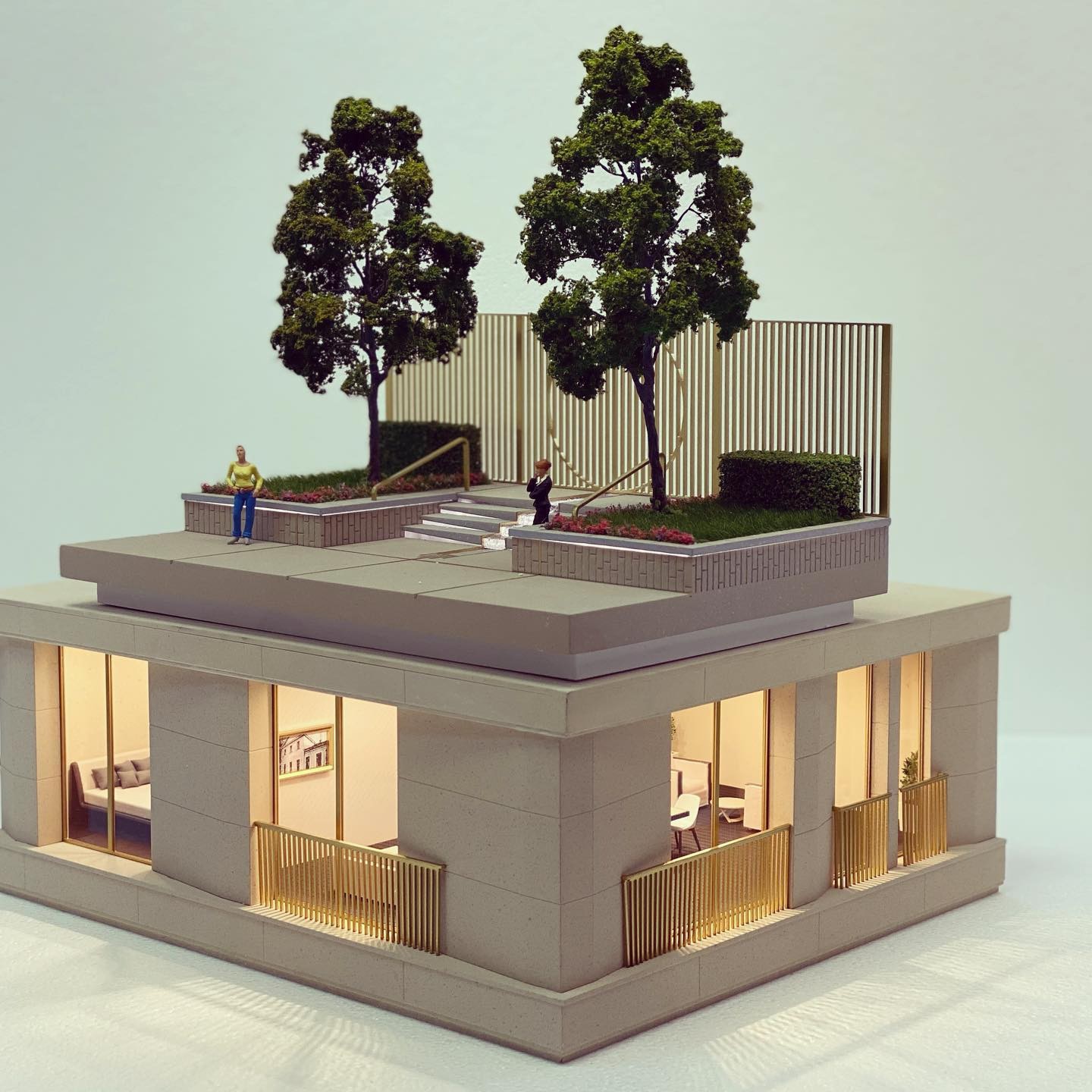 A miniature appartment with a park on the roof