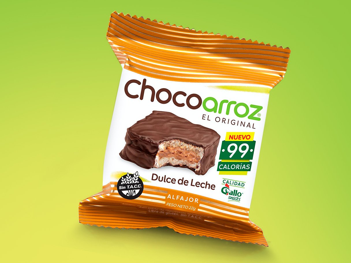 Rustic cabin in a golden field at sunset