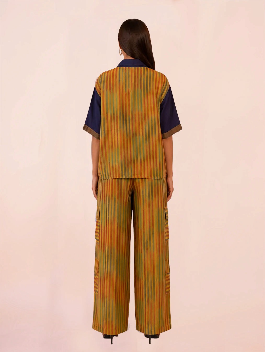 RAGA XII PANT SET is our one of a kind printed silk shirt and pant set, handcrafted by skilled artisans in house using a vintage silk saree.