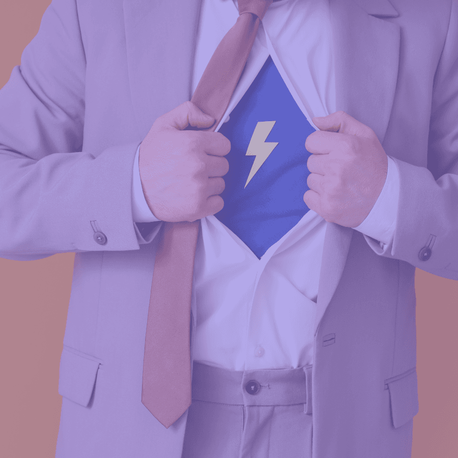 Person in a suit pulling open their shirt to reveal a lightning-bolt emblem underneath, symbolising the power and impact of clinical trial consultants boosting capacity and performance.
