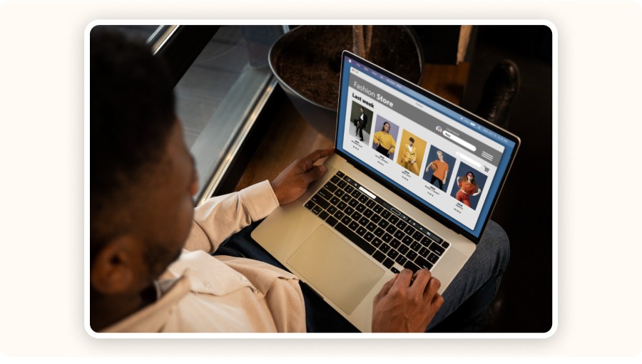 User browsing an online fashion store on laptop