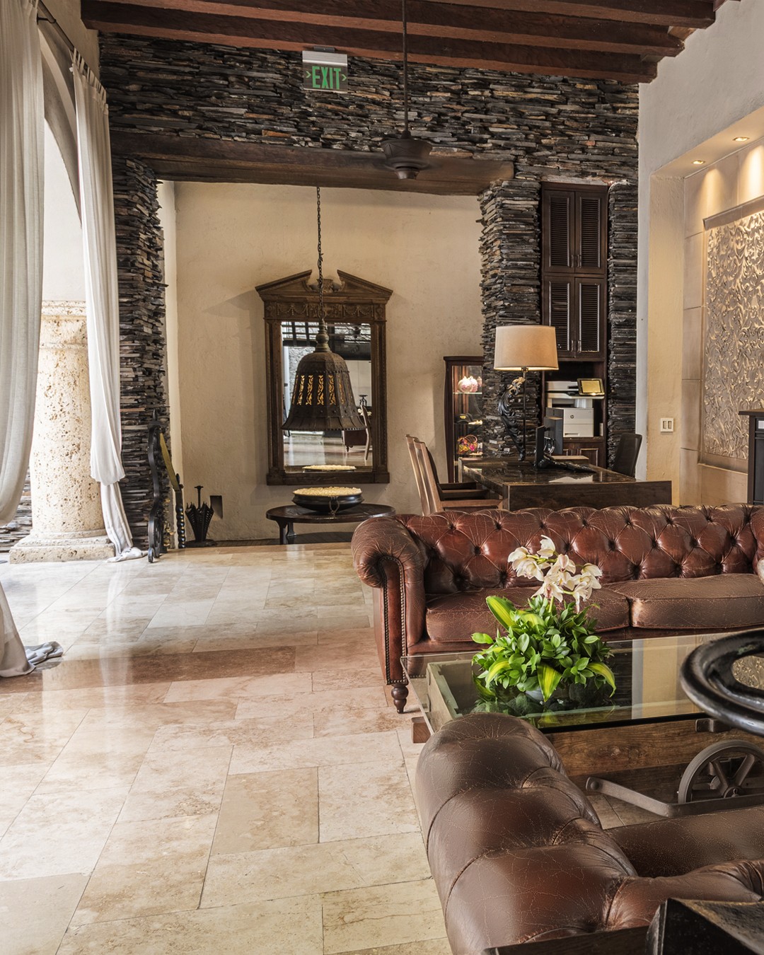 Creative portrait with geometric pink eyewear and bold fashion styling in urban setting