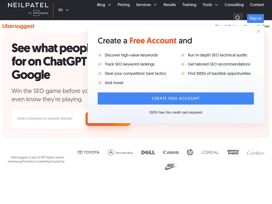 The image displays the Ubersuggest homepage with a prominent call to action to create a free account for accessing SEO tools and features like discovering high-value keywords and tracking keyword rankings.