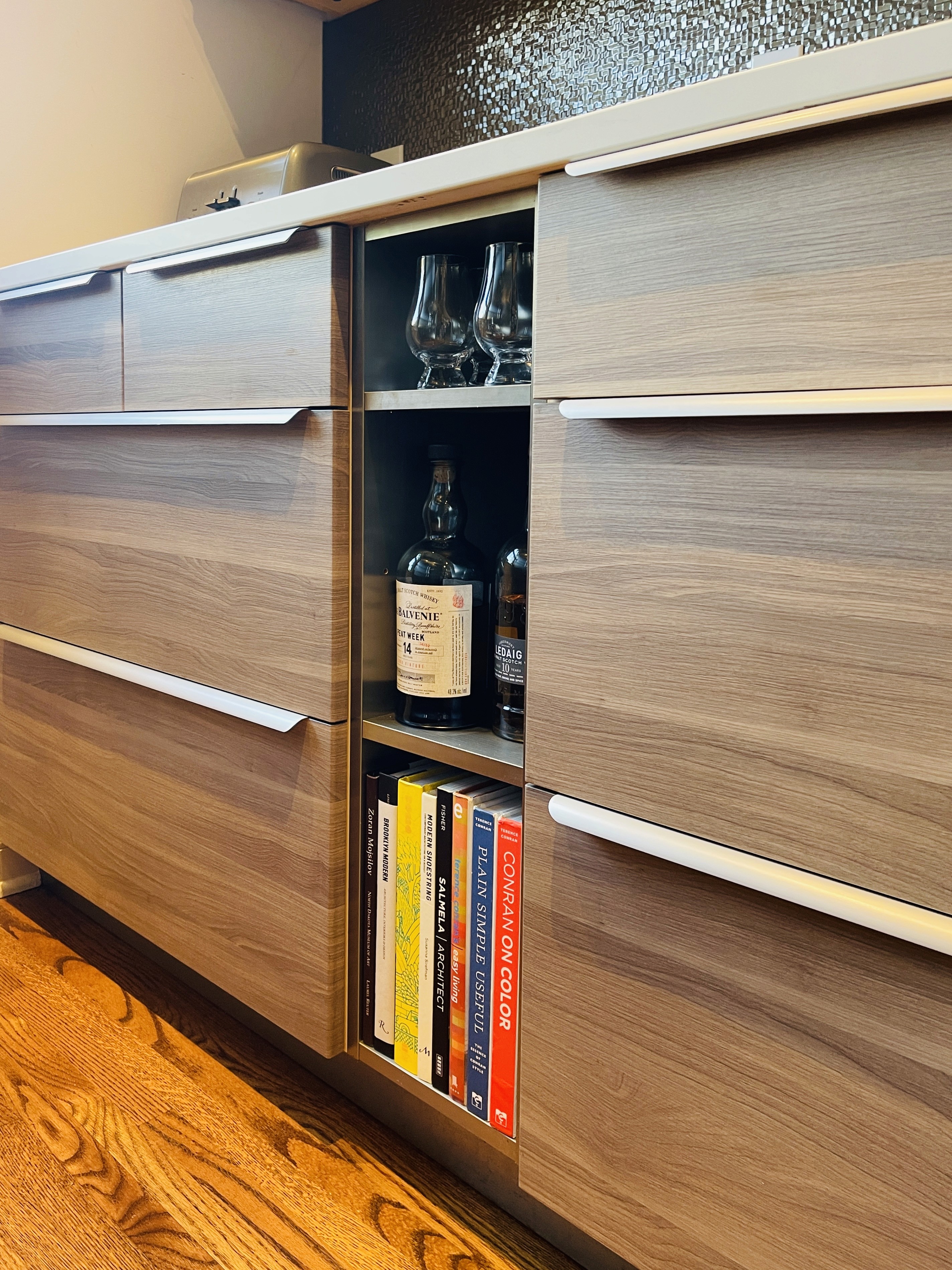 Custom gray cabinetry detail with built-in bookshelf nook, Diamond Lake kitchen
