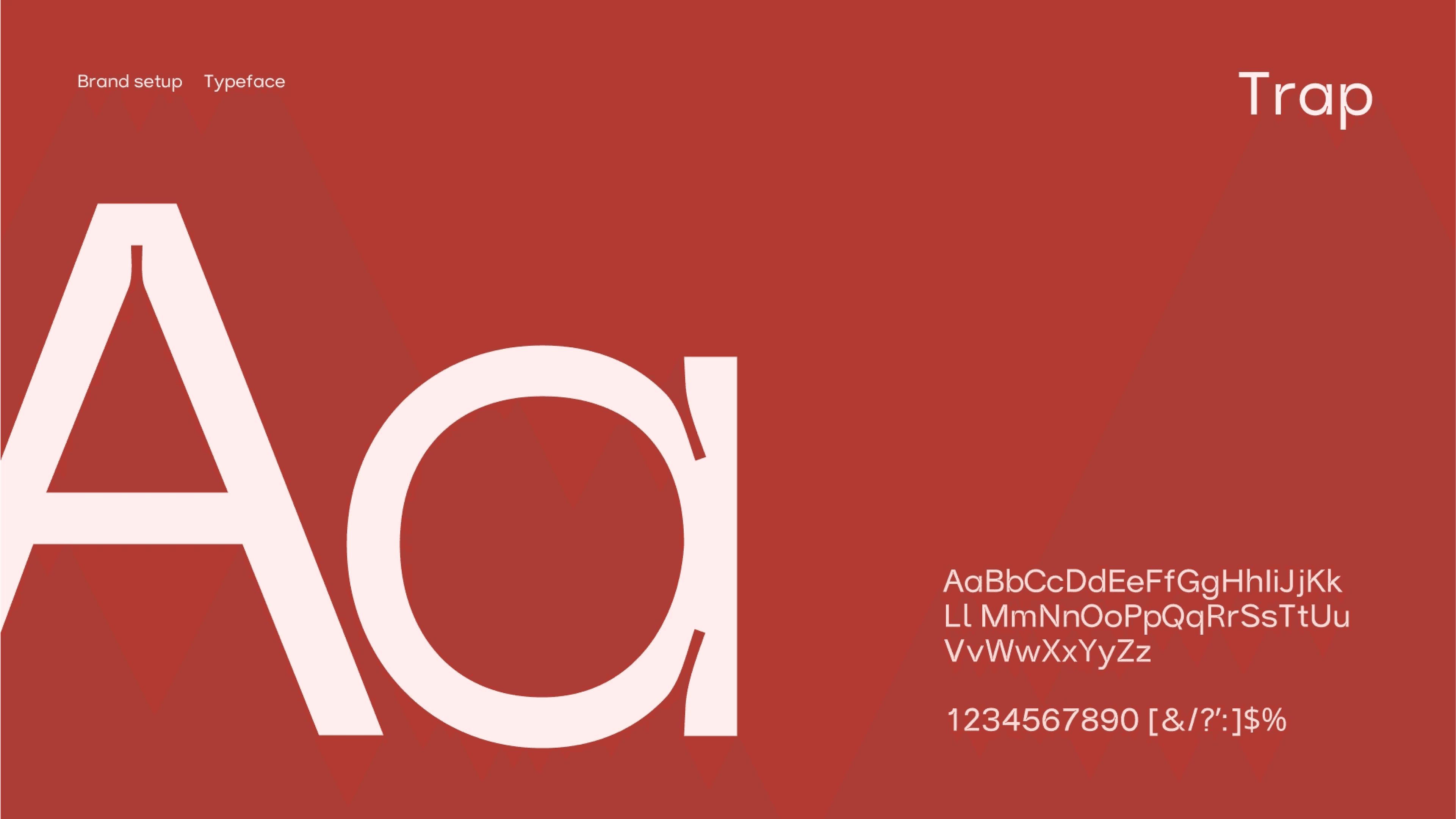 A typography showcase featuring the Trap typeface on a bold red background. The specimen displays oversized letterforms, the complete alphabet in uppercase and lowercase, numerals, and punctuation, demonstrating the font's distinctive geometric style for use in branding and digital design.