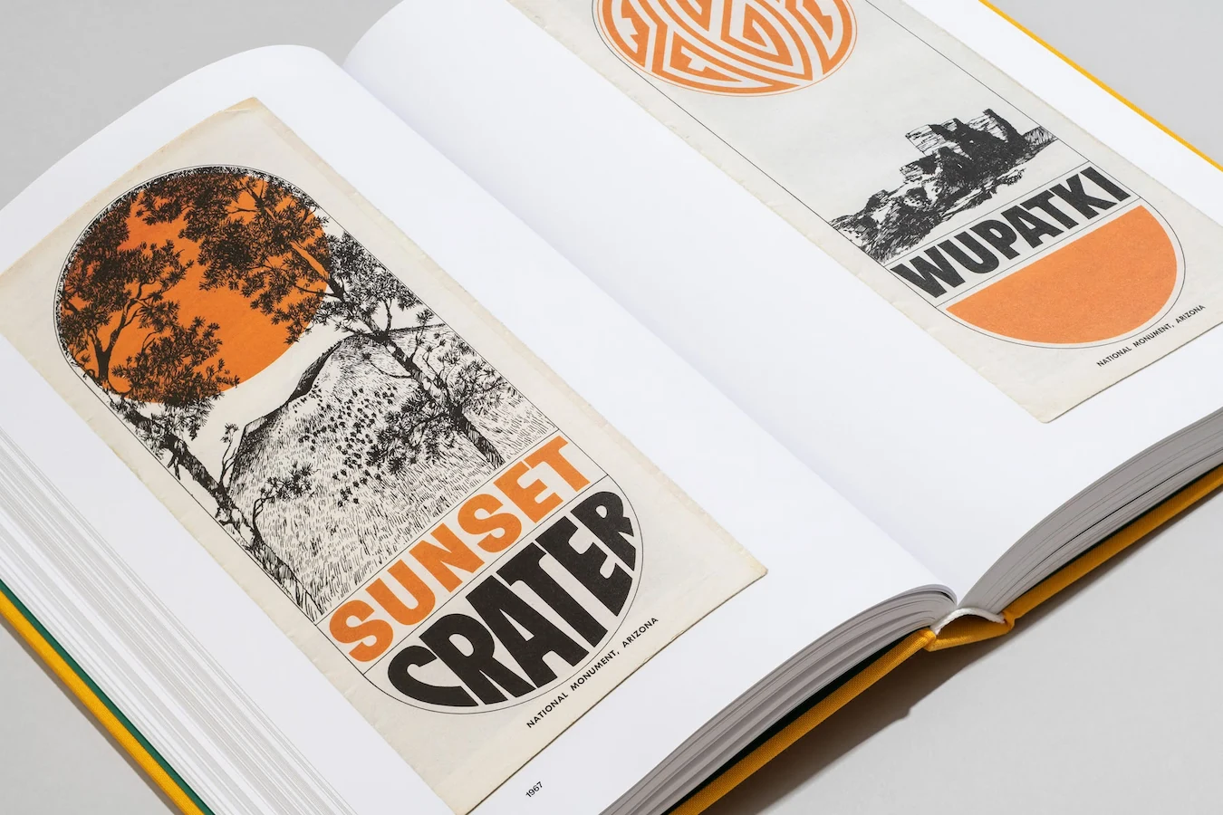 Opened view of book showing graphic designs