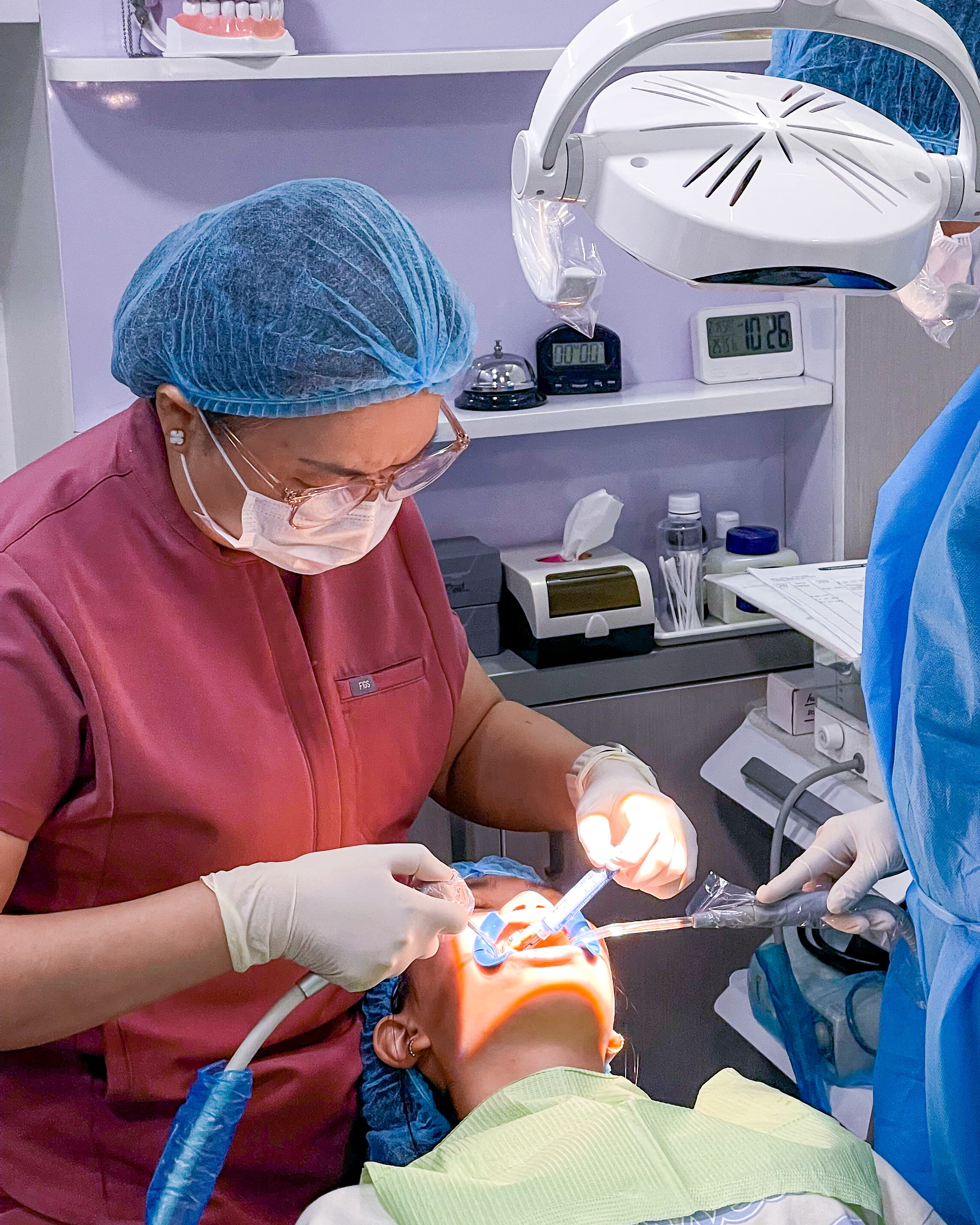 Orthodontic treatment and braces adjustment performed by dentist at K DentArtistry dental clinic in Makati.