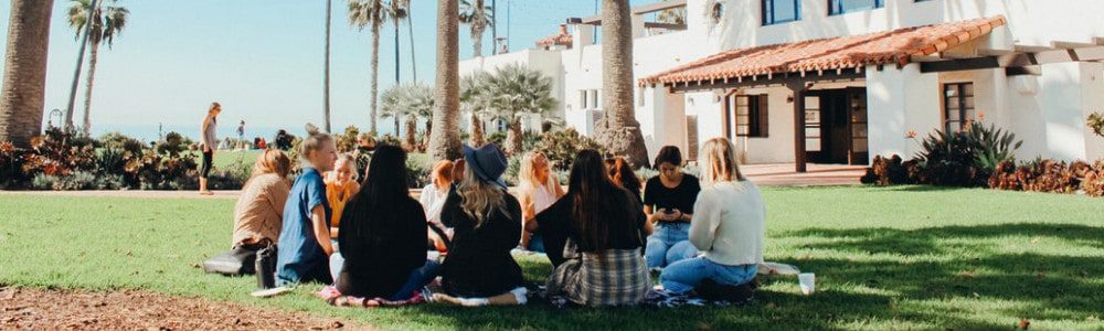 group of people on a lawn