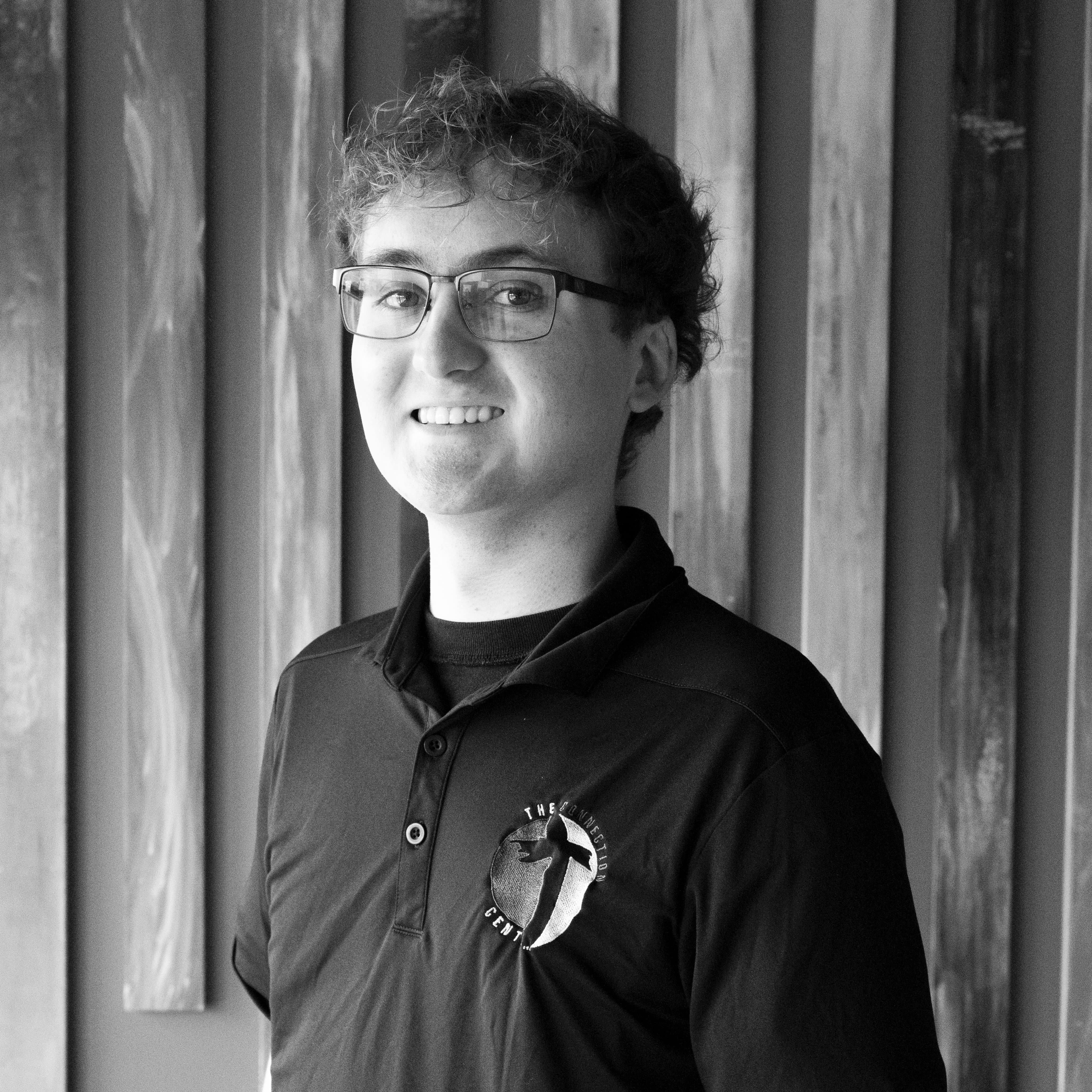 Black and white headshot of Jacob Boissy, facing the camera.
