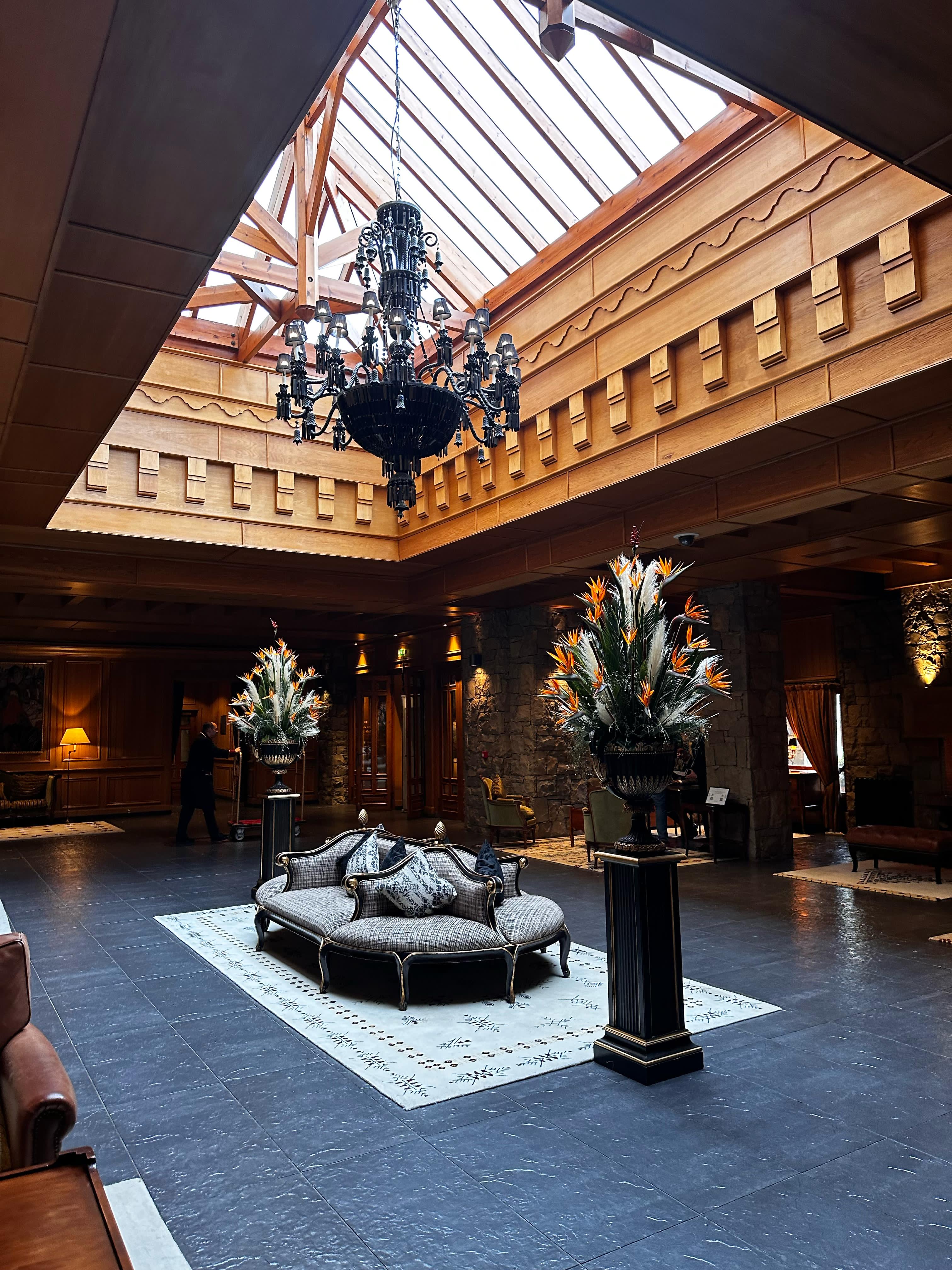 people in a large building with Tate Modern in the background