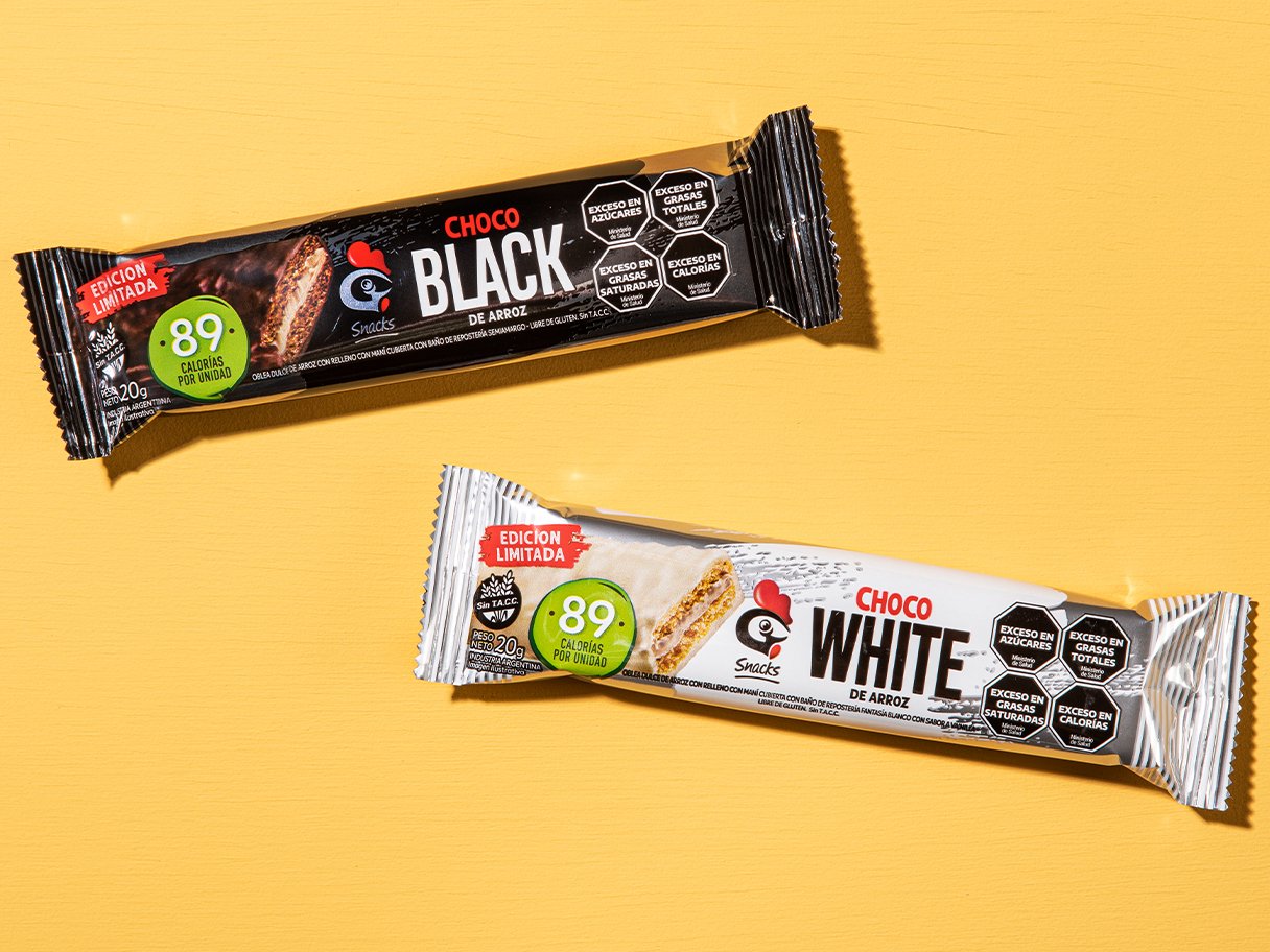 Rooftops of a coastal town with the sea in background