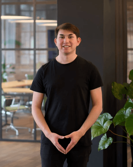 grayscale photography of man wearing crew-neck shirt