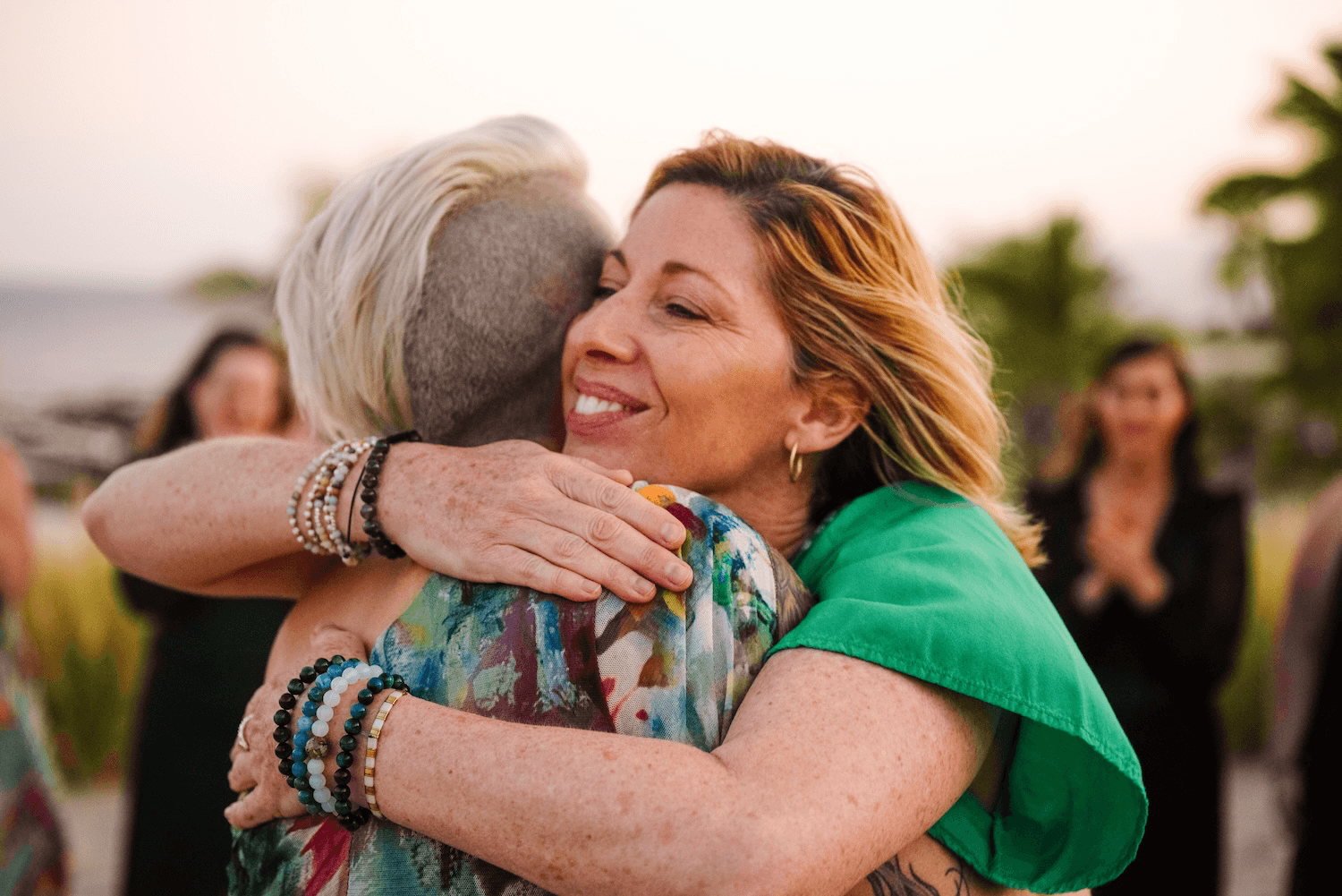 Sandy Lutton hugging Melanie Spring