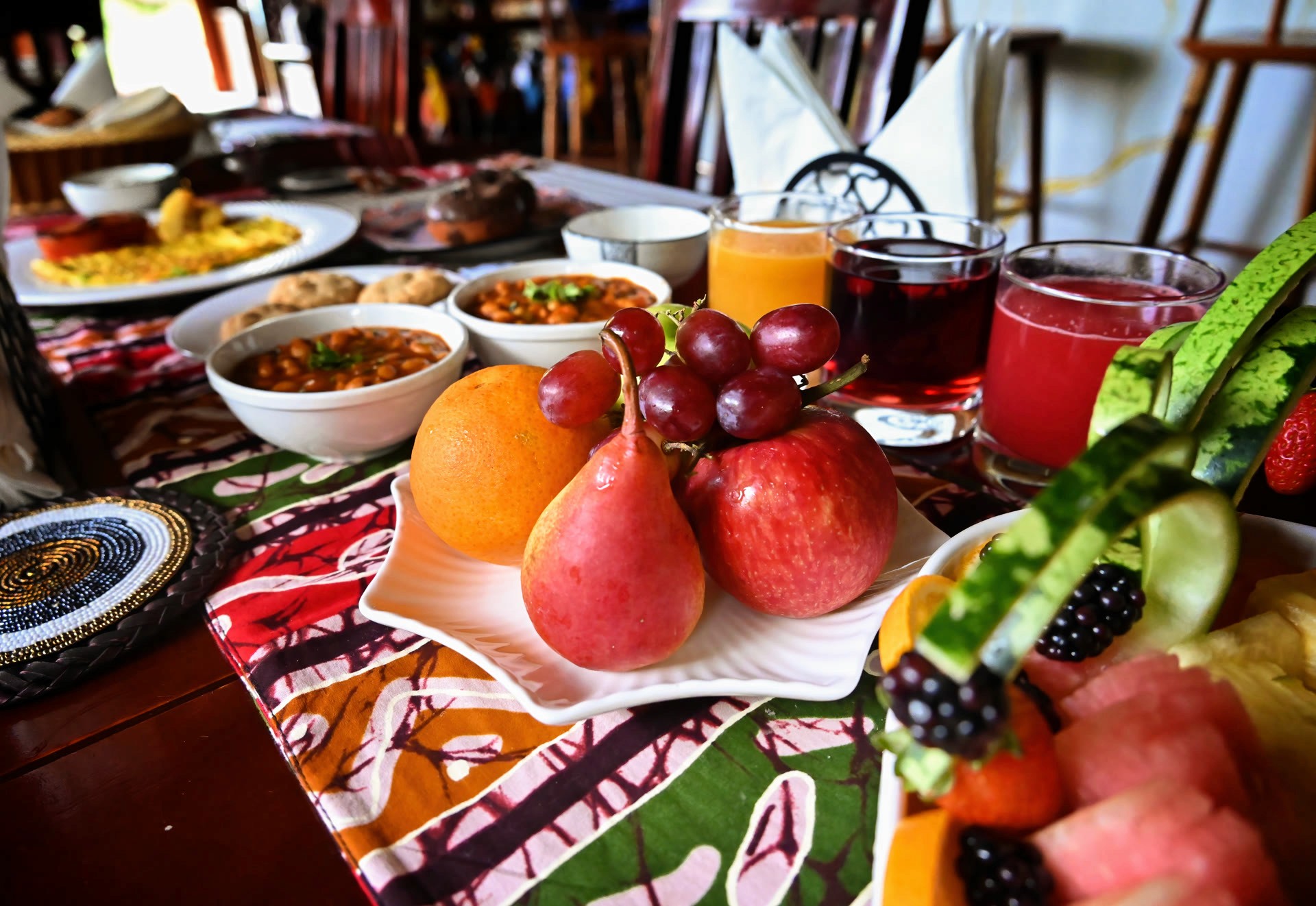 Breakfast spread with fruit and juice