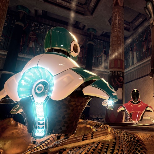 Two robots, one green and one red, in an ancient Egyptian-themed room with hieroglyph-covered columns and walls.