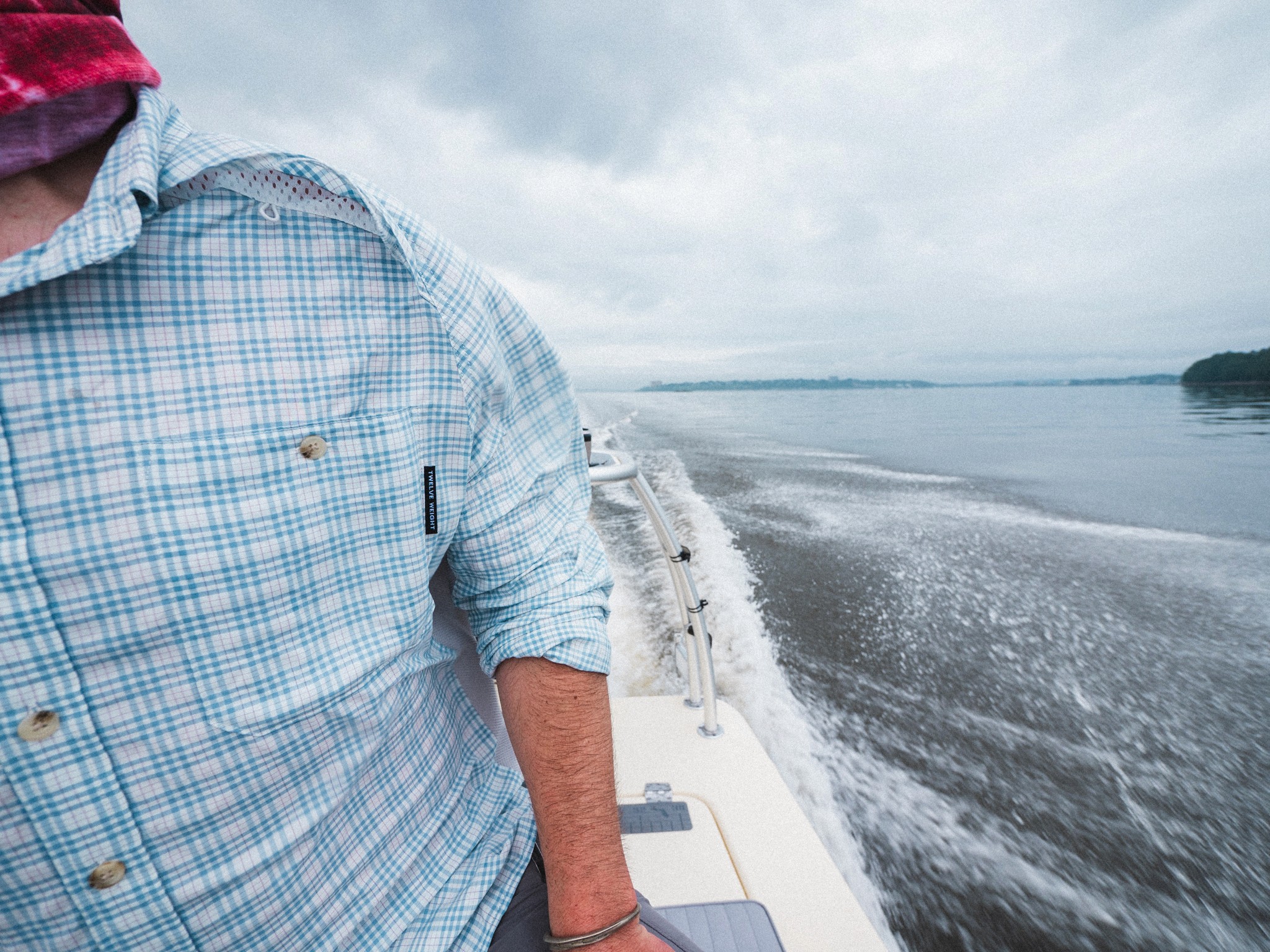 Twelve Weight shirt worn while moving through water on a boat in natural conditions