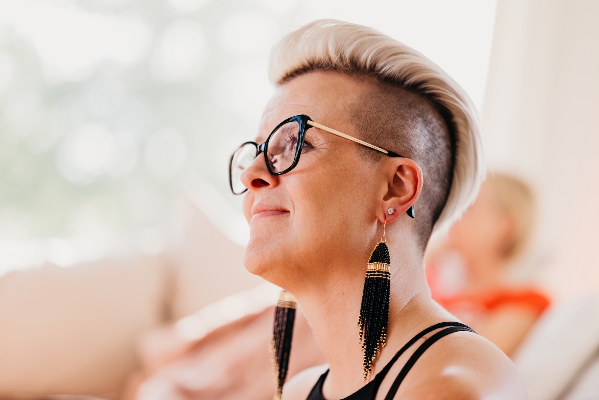 Group of people relaxing outdoors on a field or lawn