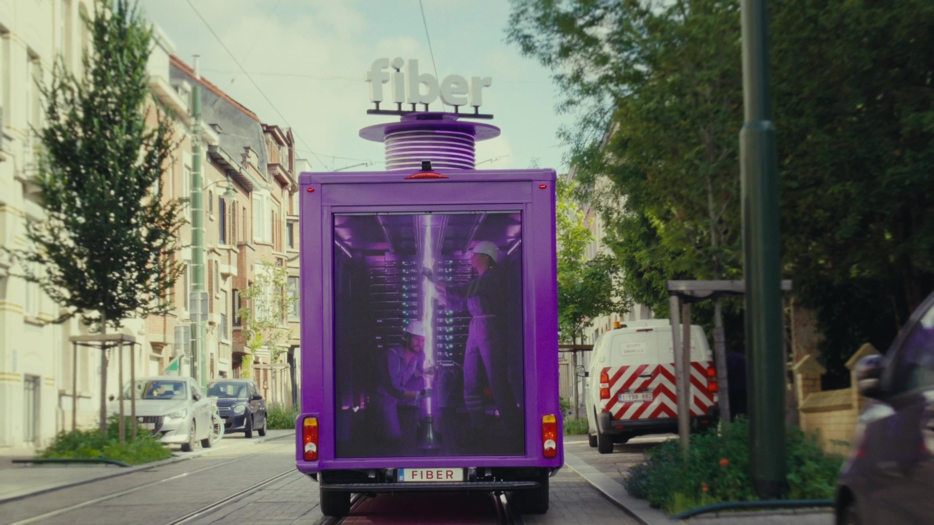 Truck driving around the city with a led display in the back projecting the campaign video