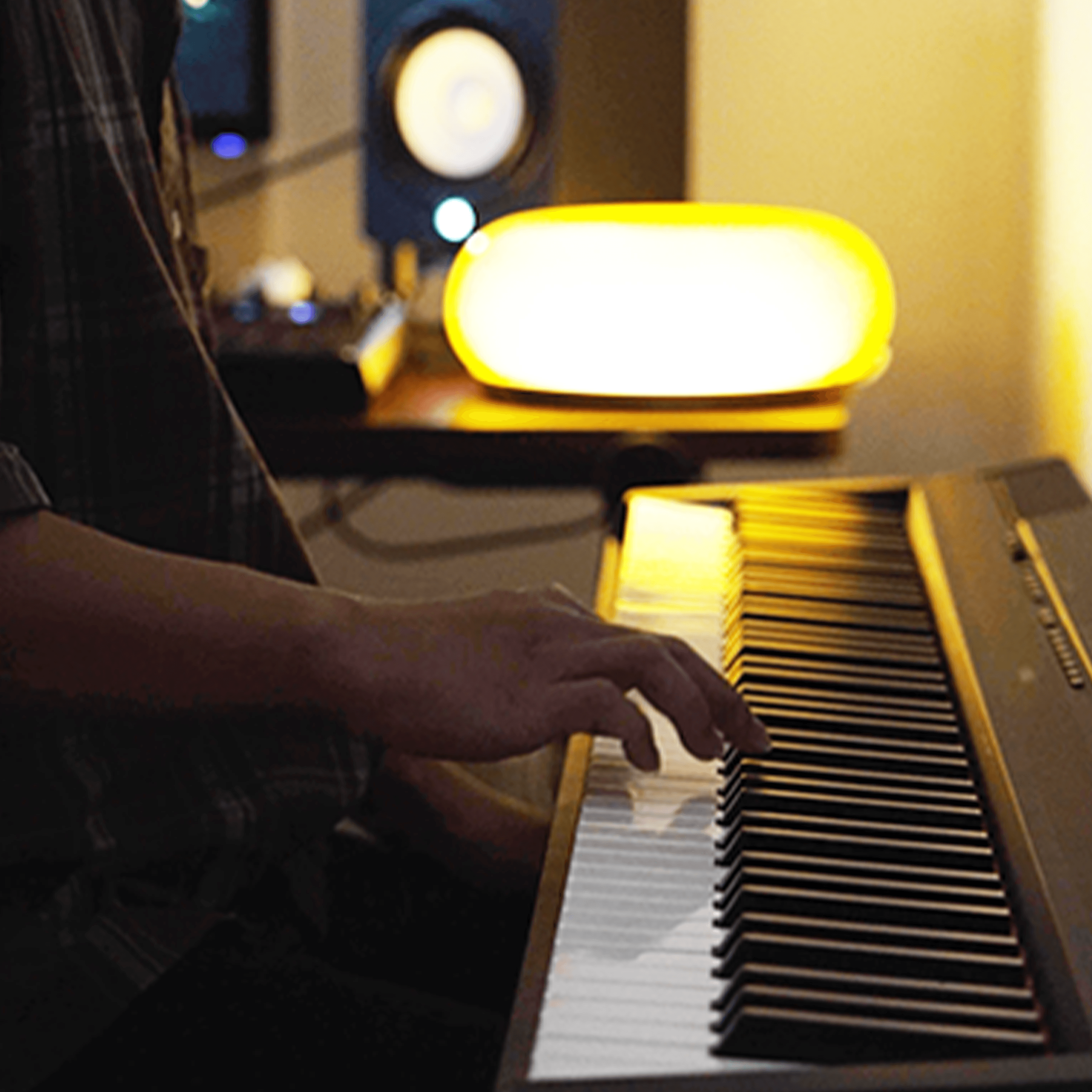 hotpotatoes, Singapore lo-fi producer and pianist Lebrone, playing piano keys while composing instrumental music in his home studio