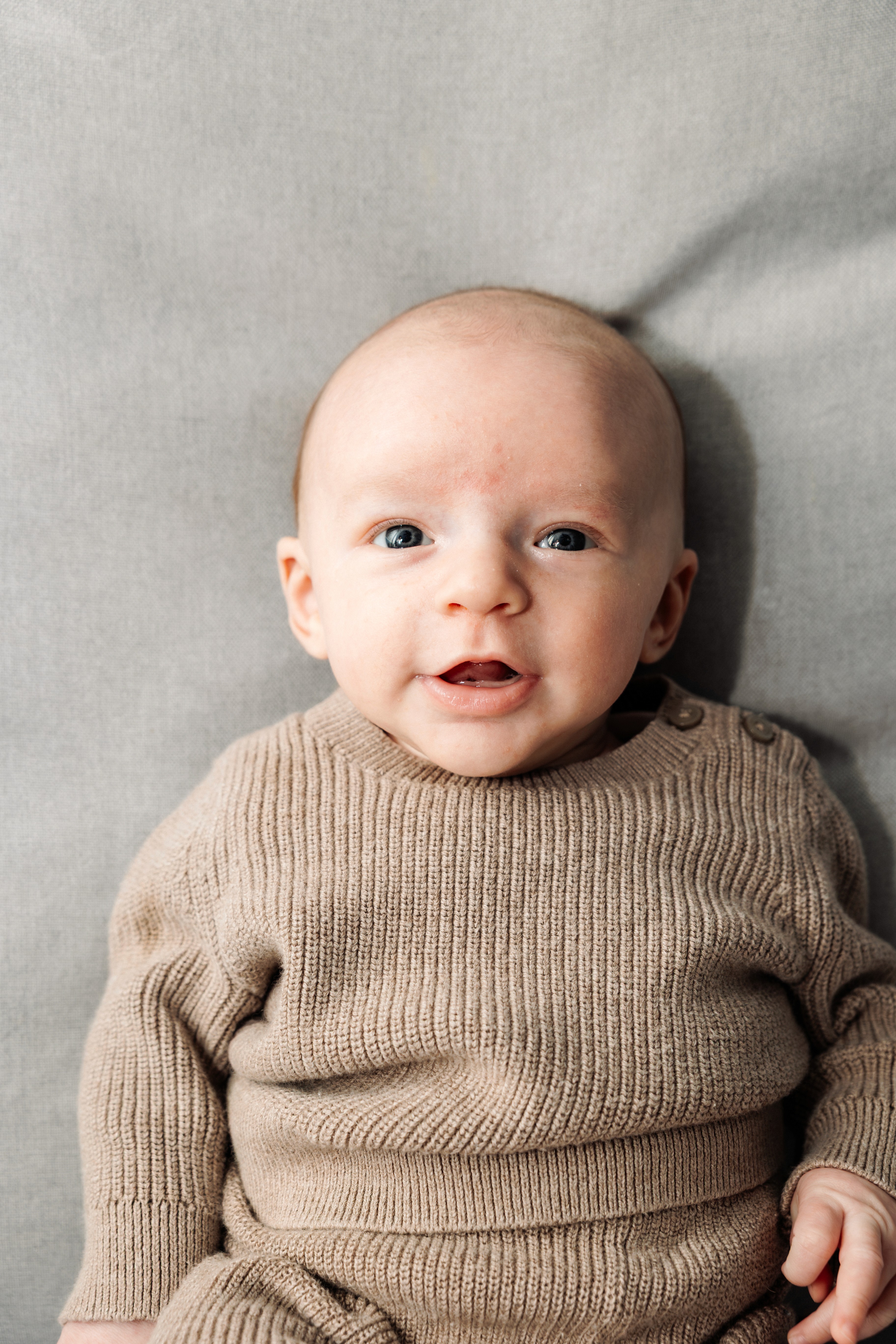 4:59 PMCouple caught in a genuine laugh on the stairs at Bethesda Fountain in Central Park, NYC — fun, unposed couples photography by Lizz Spano Photography, New York City couples photographer.