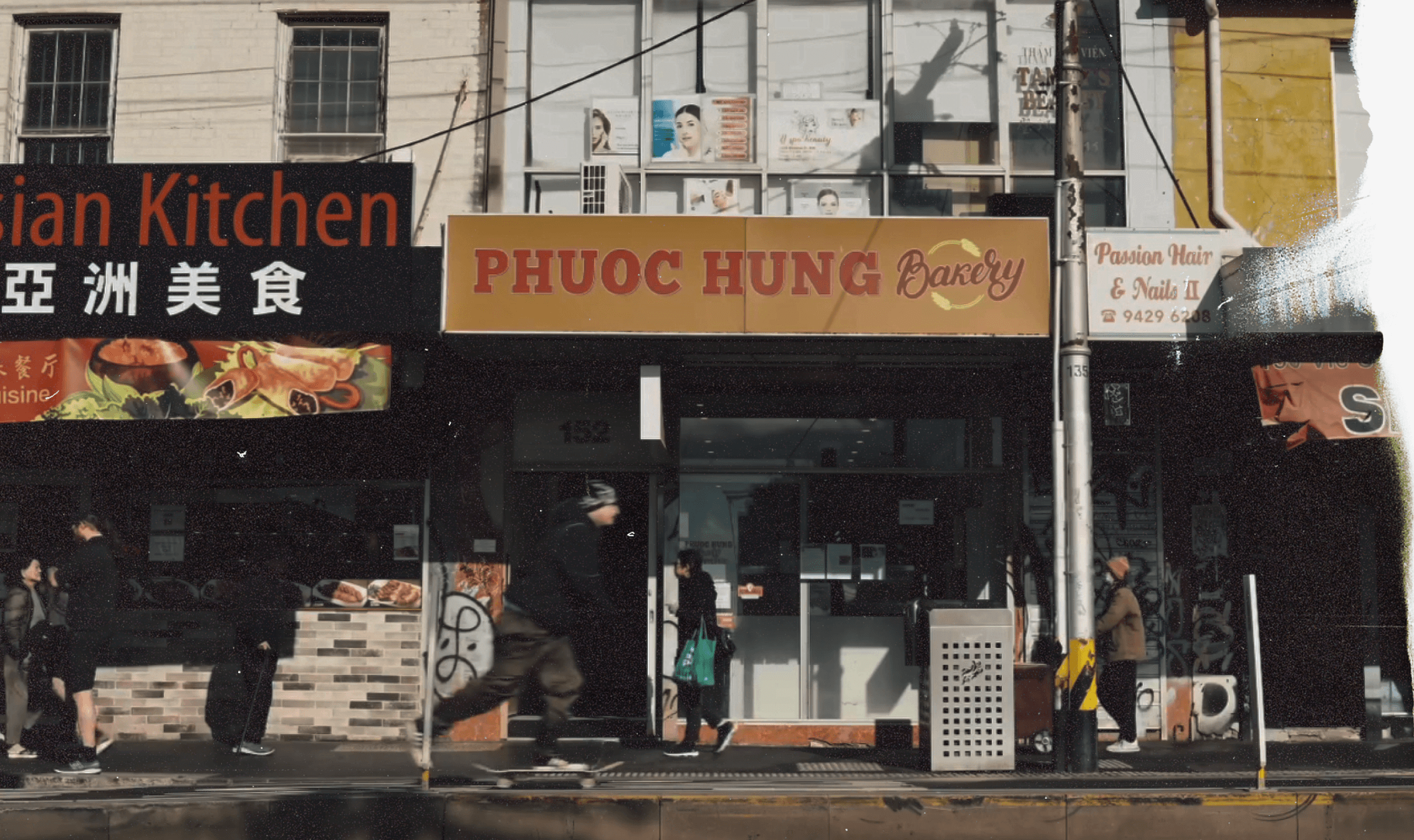Stack of modern books and magazine with minimalist cover design on leather chair