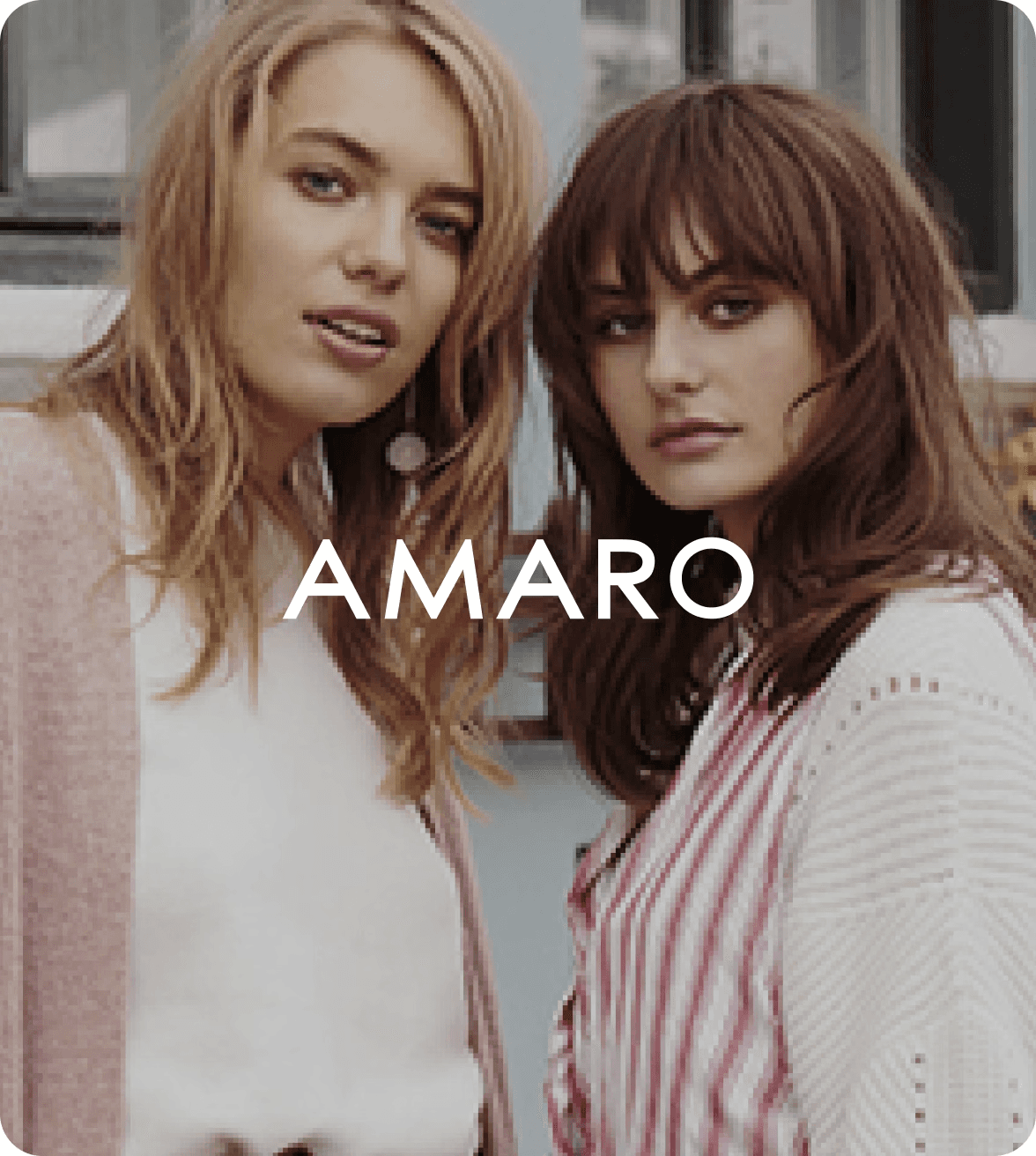 two women looking into the camera wearing amaro clothing