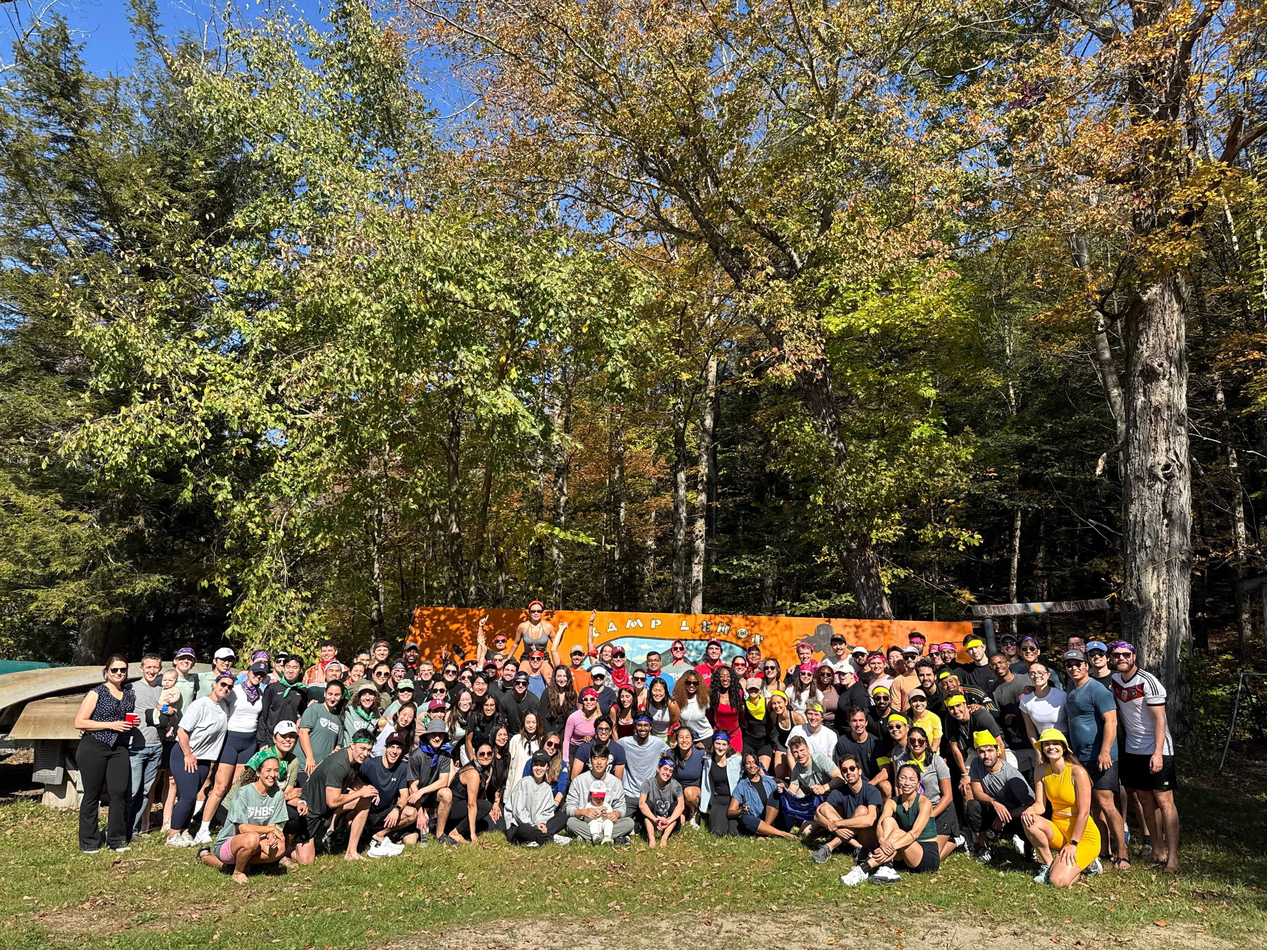 Large retreat group photo in the woods at Camp Lenox