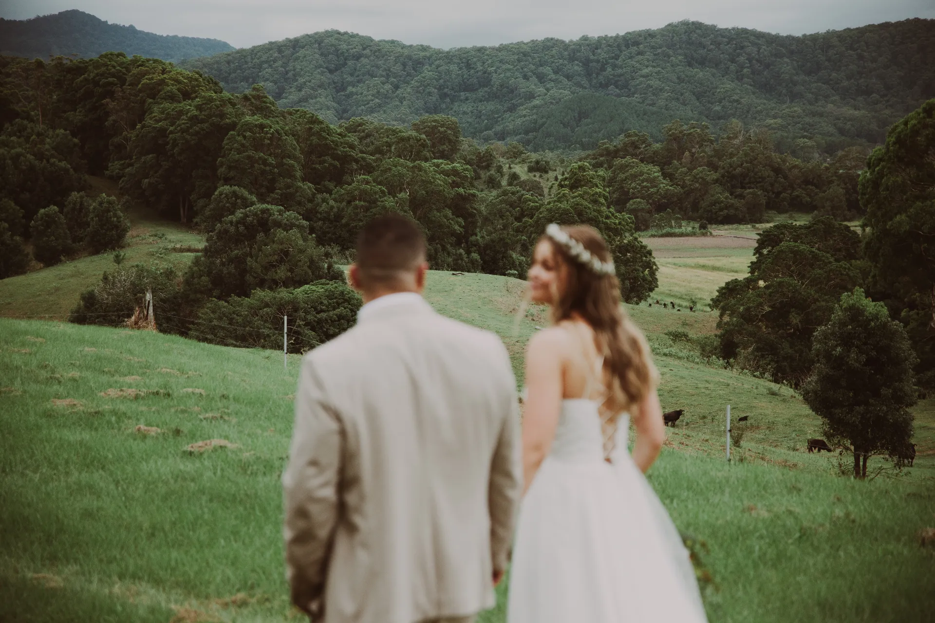 man and woman holding hands focus photo