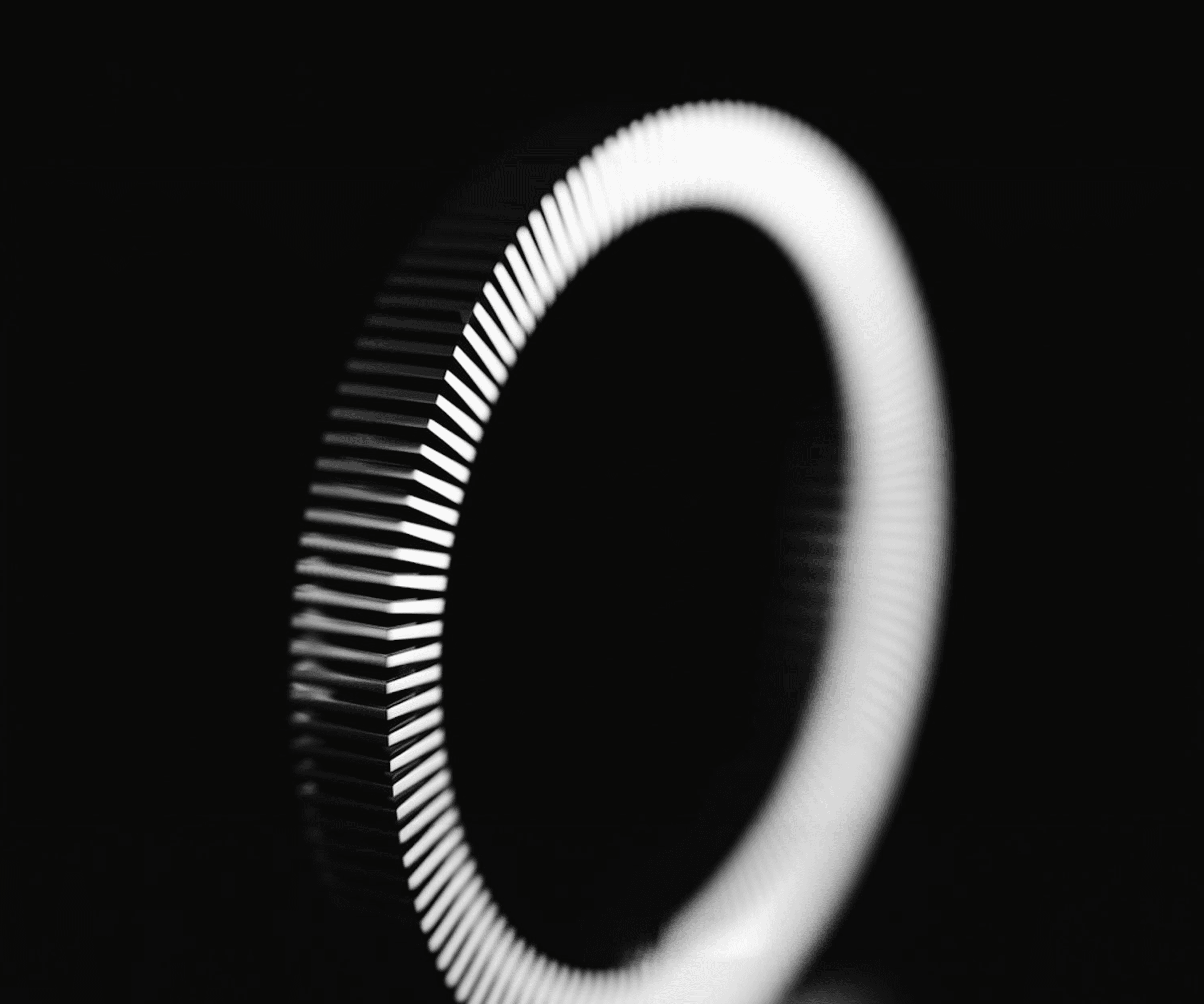 Abstract circular structure on dark background — visual metaphor for redesign logic and product architecture in studio design process