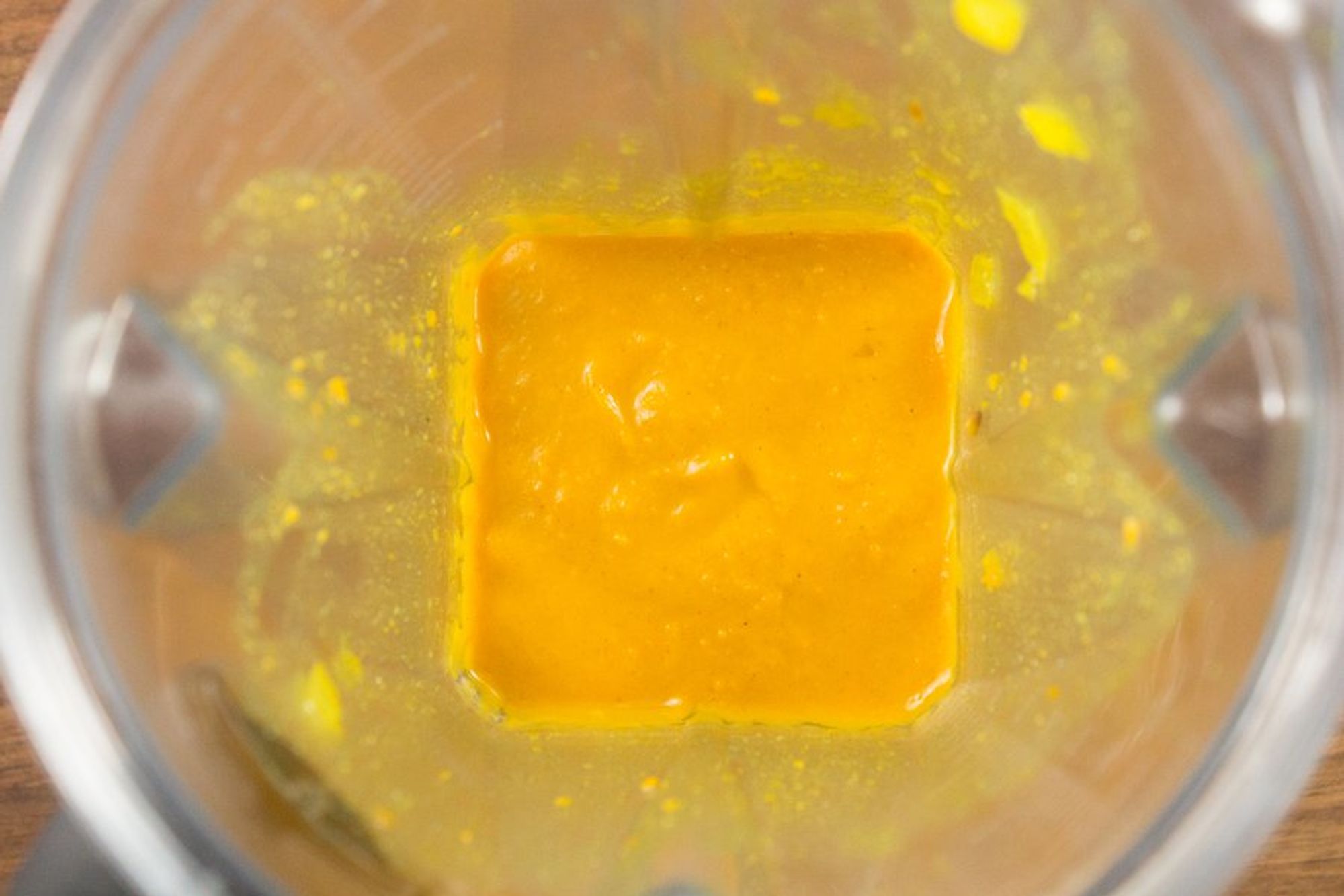 smooth and creamy sweet potato soup in a blender