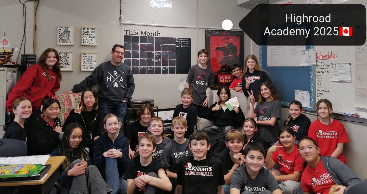 a group of young children riding skis down a snow covered slope