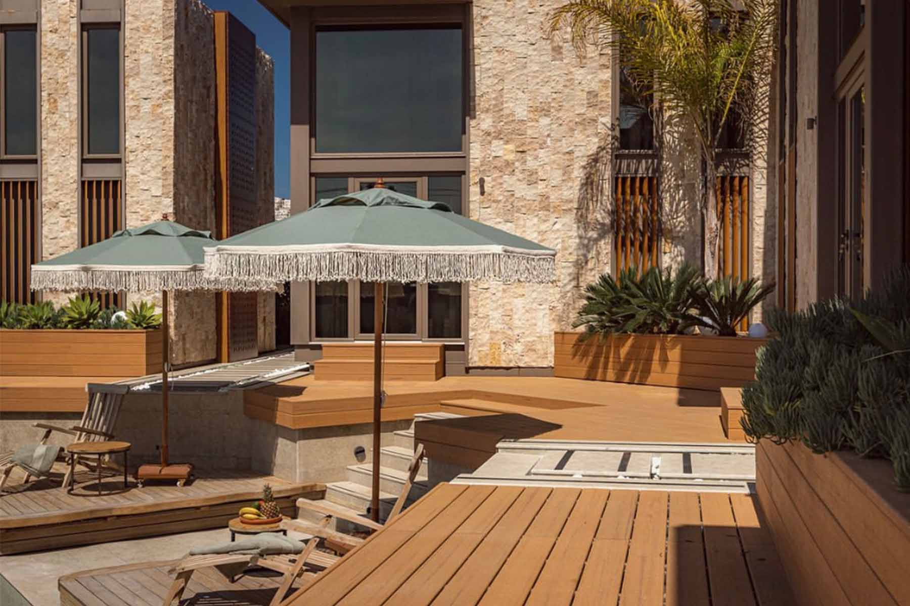 two people looking at a tablet and smiling