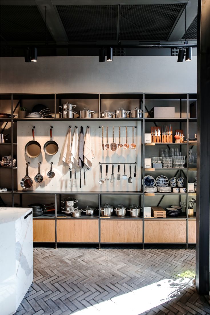 A man playing a drum in front of a group of people