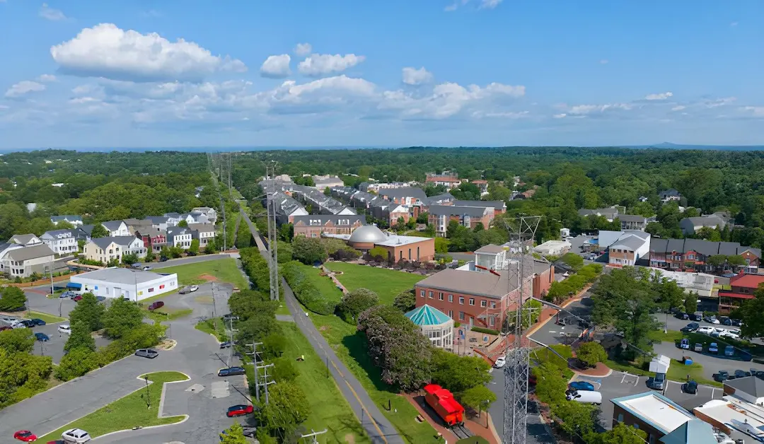 An aerial view of Downtown Herndon showing the historic caboose and W&OD trail, serviced by an expert plumber in Herndon, VA.