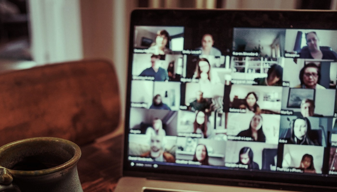 Online video call with team members on laptop