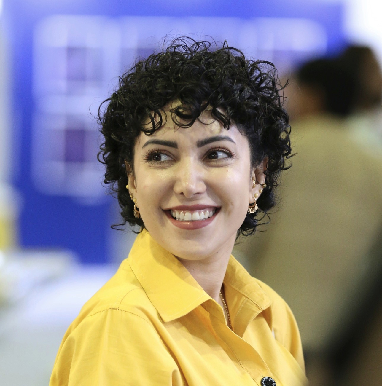 a group of people standing next to each other