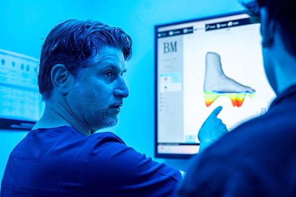 A happy doctor and old patient