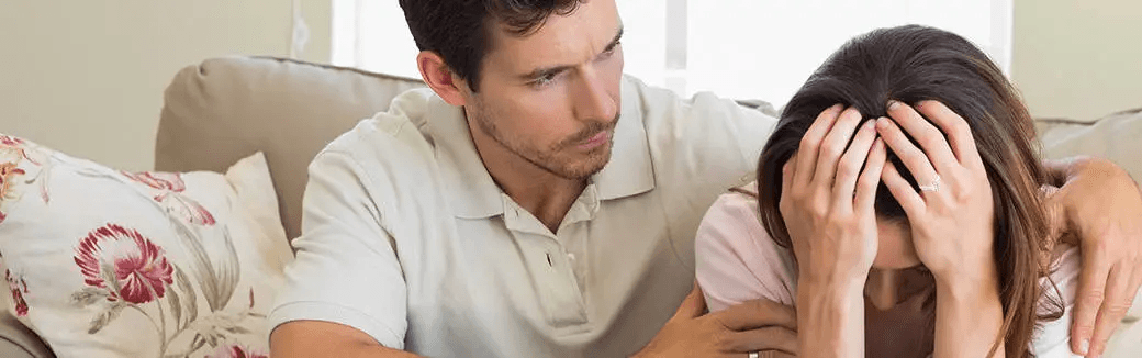 Conversion Truth for Families - 4 young women placing their hands on the back of a woman in a green top.