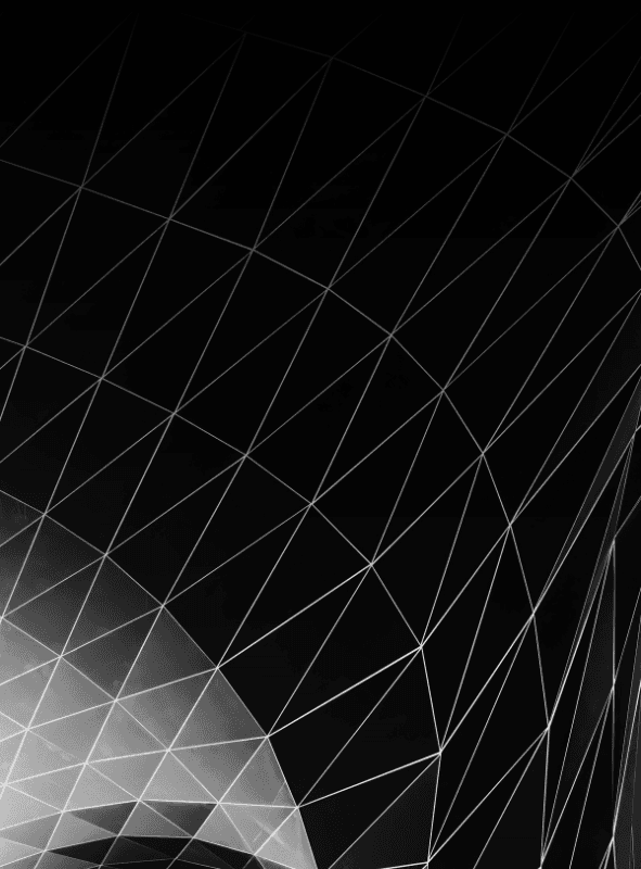 Beige stone interior with a sweeping curved staircase, tall arched windows, and minimalist decor.