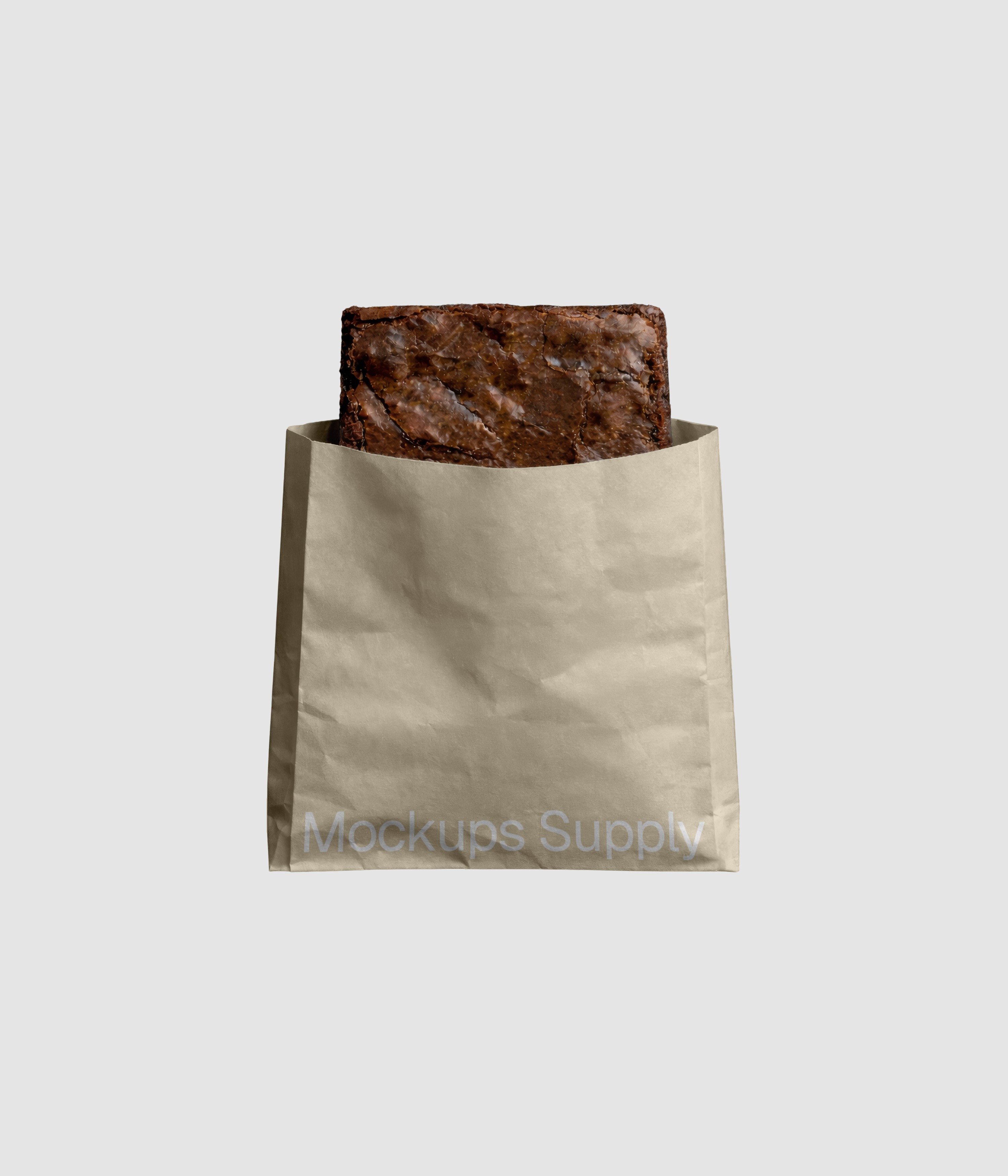 Piece of brownie cake in paper bag mockup PSD showcasing dessert packaging branding