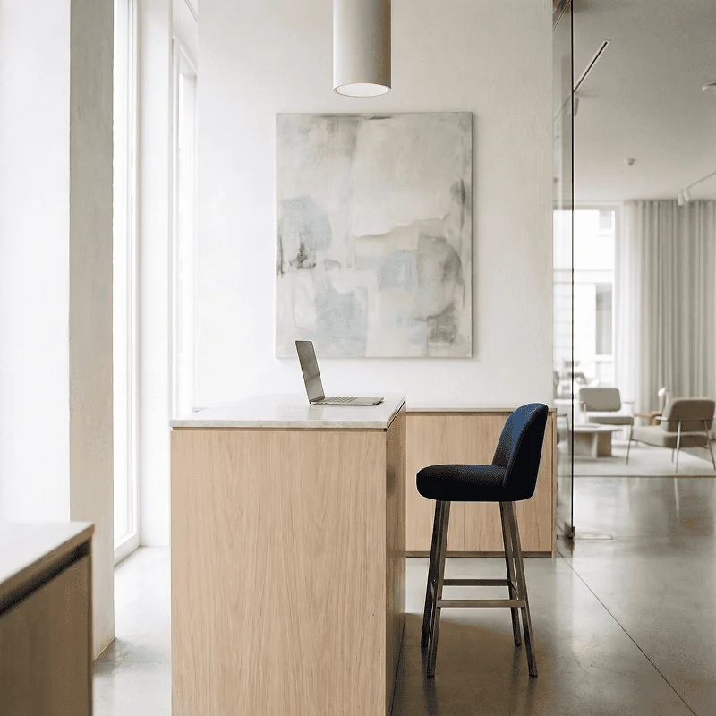 Two hotel sales colleagues reviewing a dashboard together on a tablet