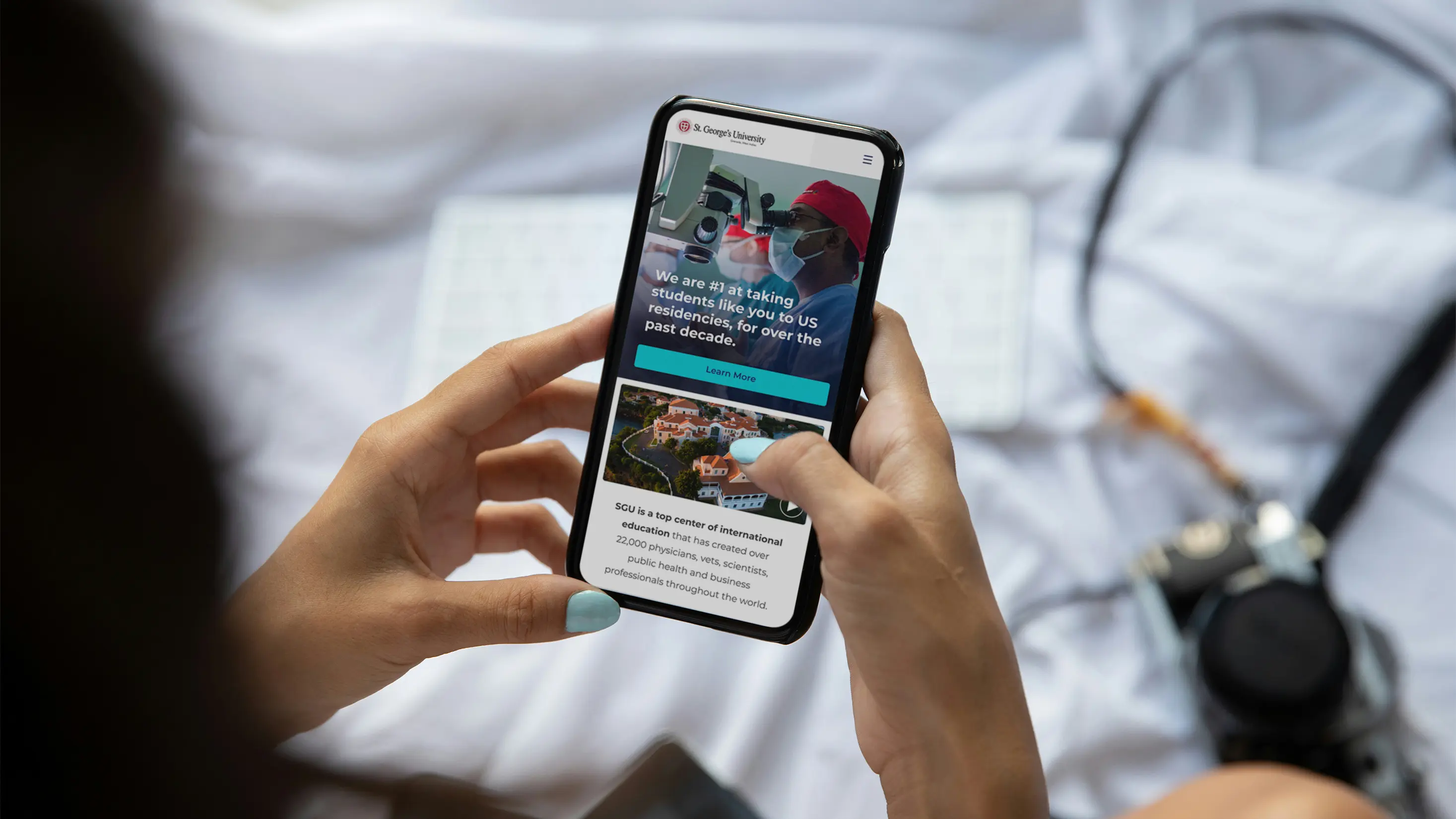 student holding a phone