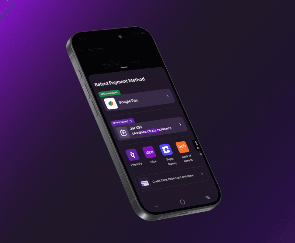 a cellphone leaning against a wall